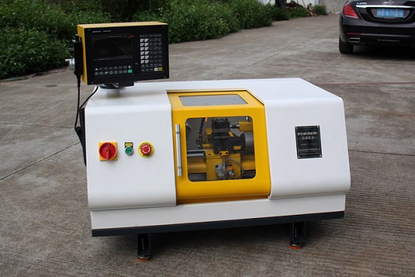 Máy tiện CNC mini CK210